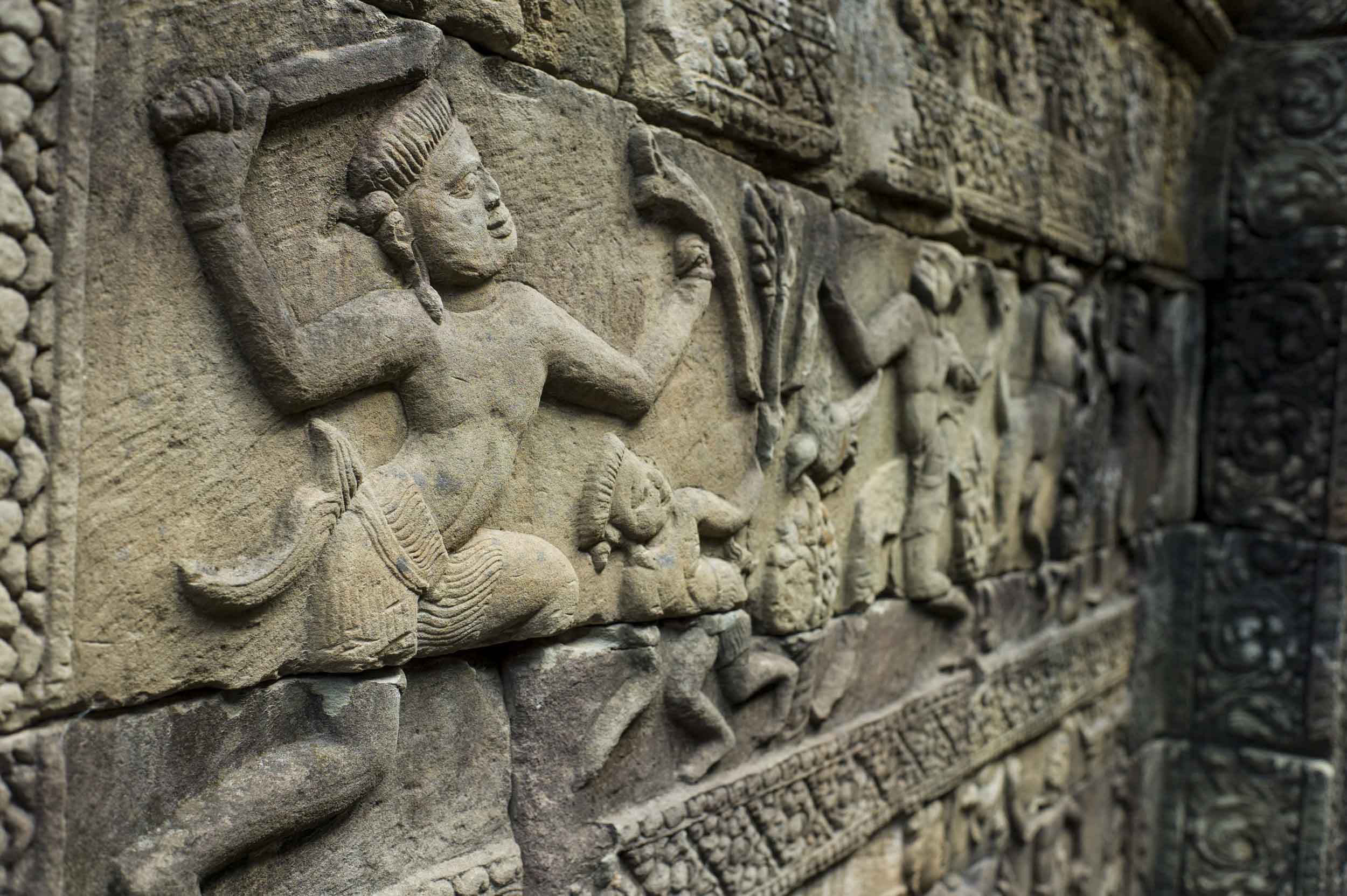 Ornate carvings adorn the walls of many Angkor temples, including at Baphuon Temple, 2012