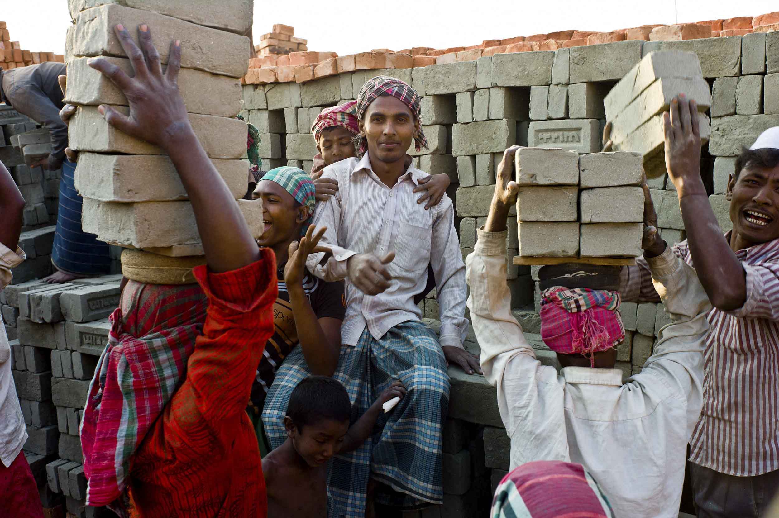 Laborers of all ages work at the brick factory, outskirts of Dhaka, 2012