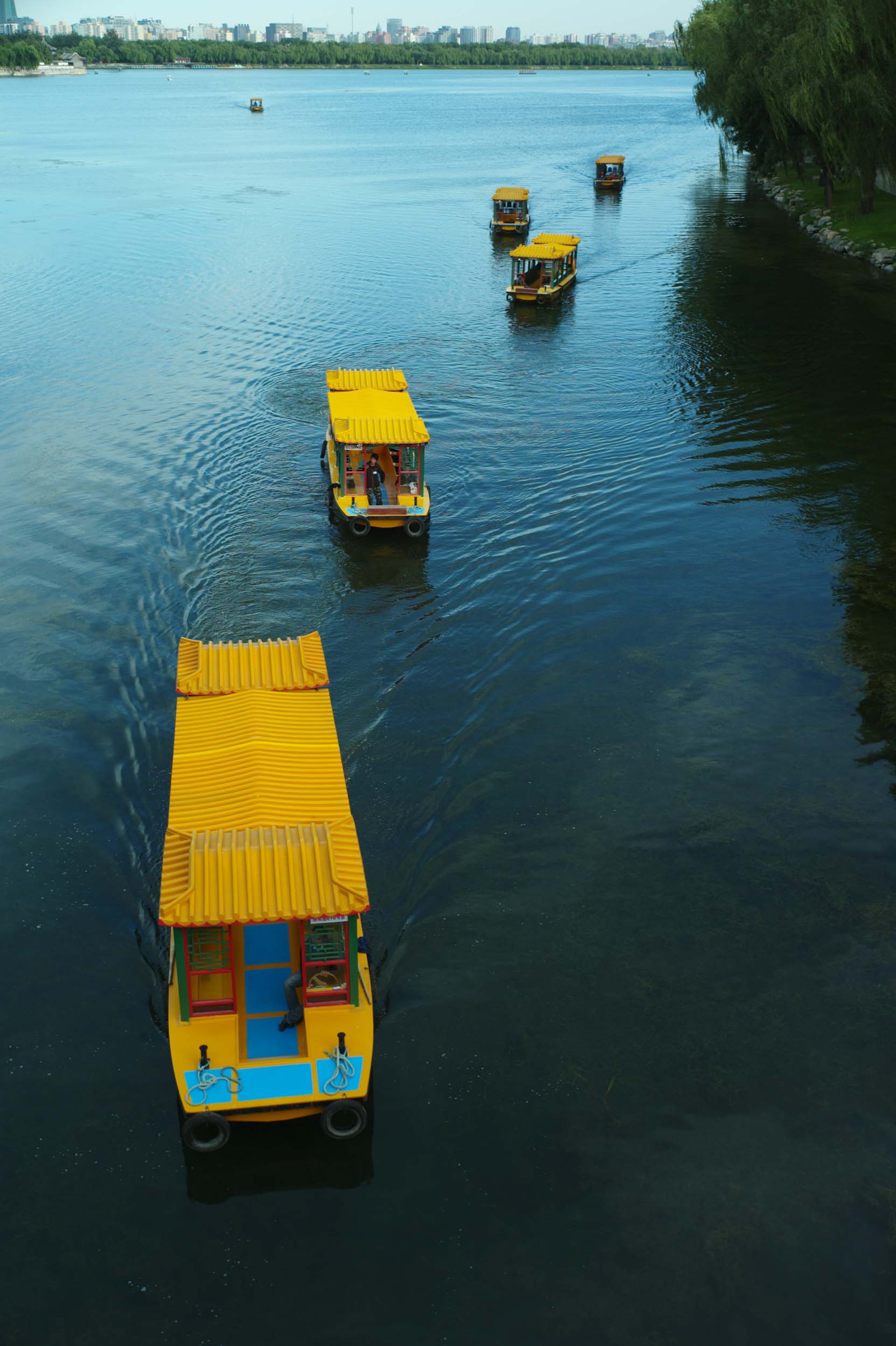 Pleasure boats motor through the Summer Palace’s sprawling Kunming Lake, 2011