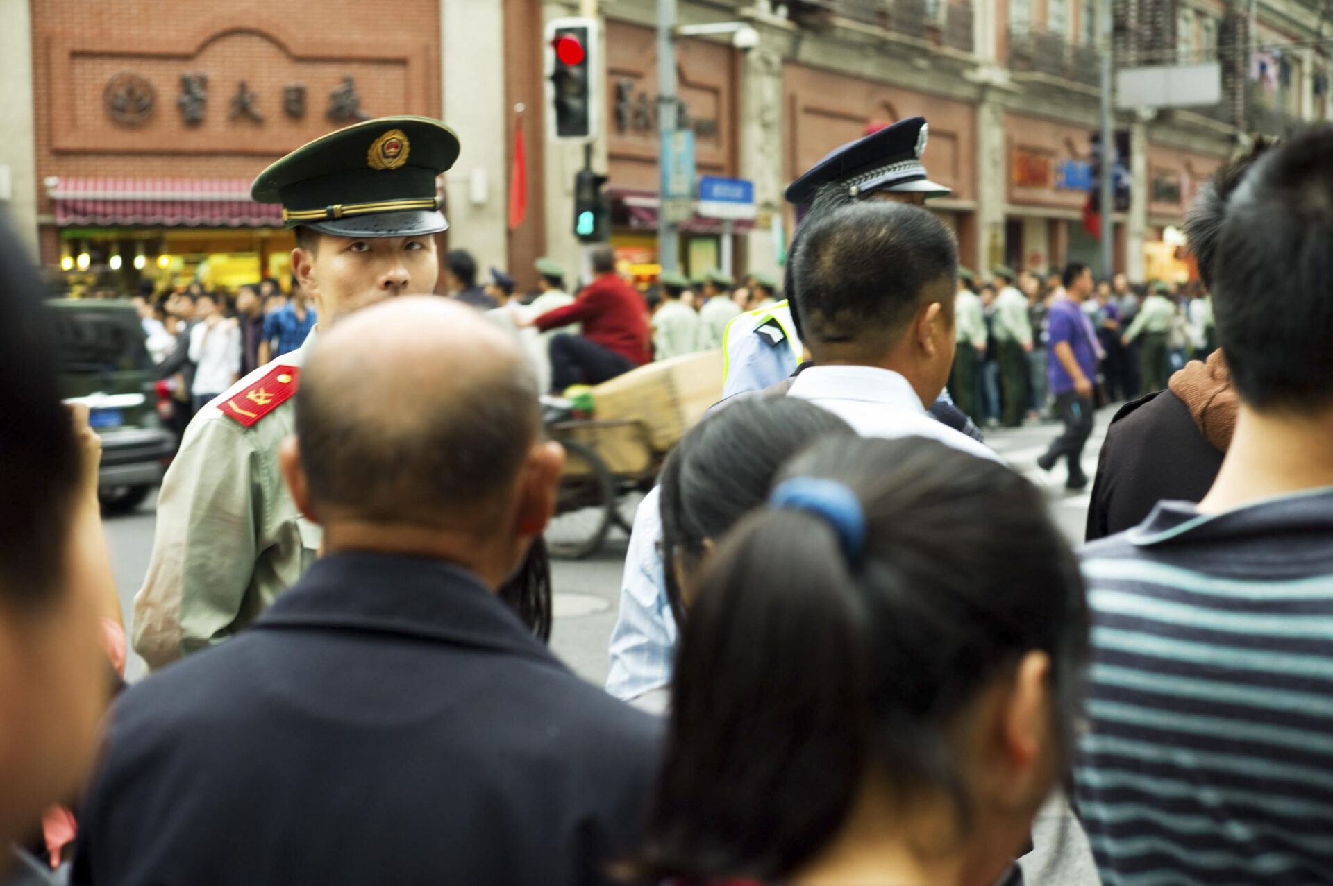 Police security on Shanghai’s Nanjing Xi Road on China’s National Day, a weeklong holiday marking the founding of the People’s Republic of China, Shanghai, 2011