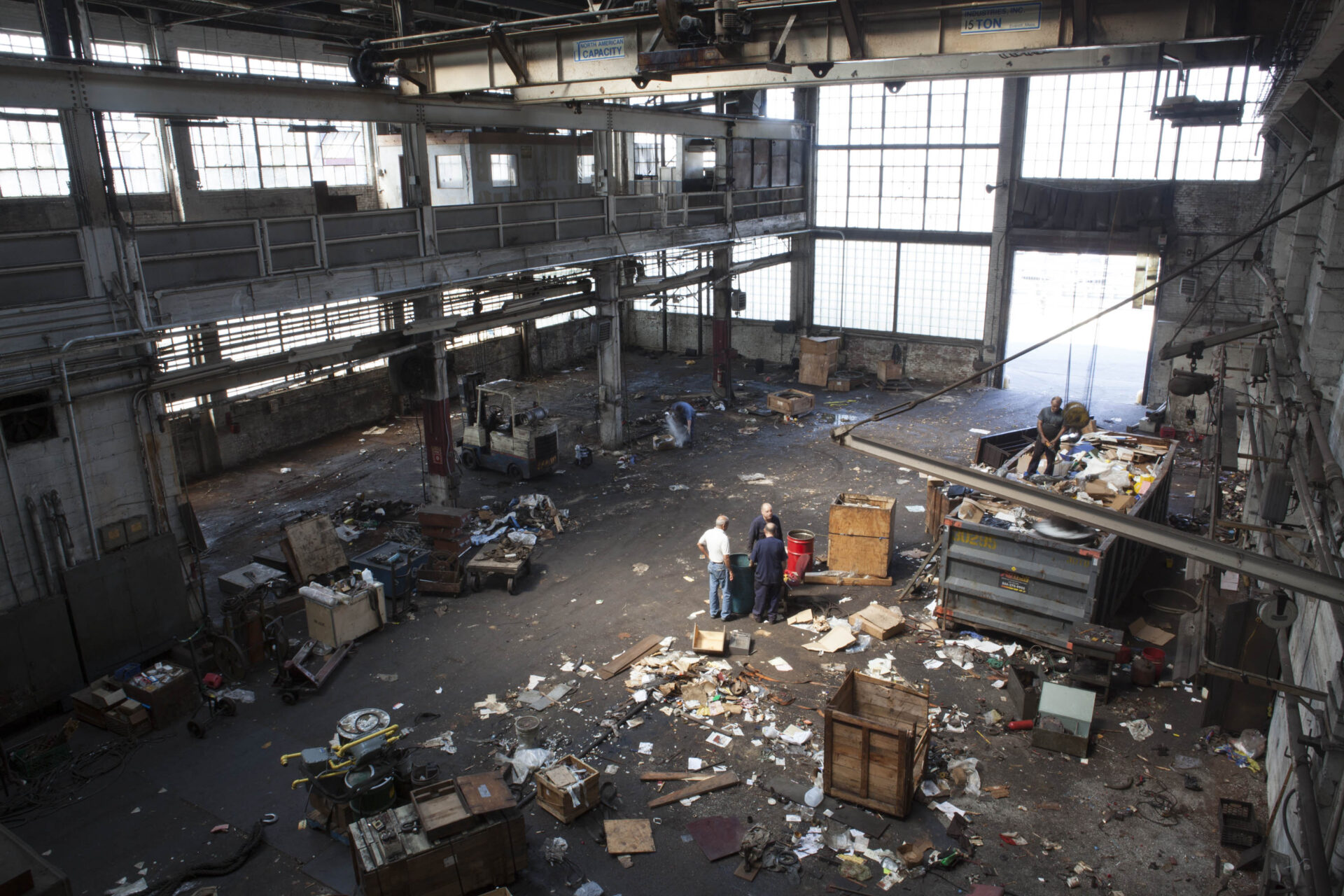 With the heavy equipment removed, soon-to-be laid off workers sort through the facility’s remaining supplies