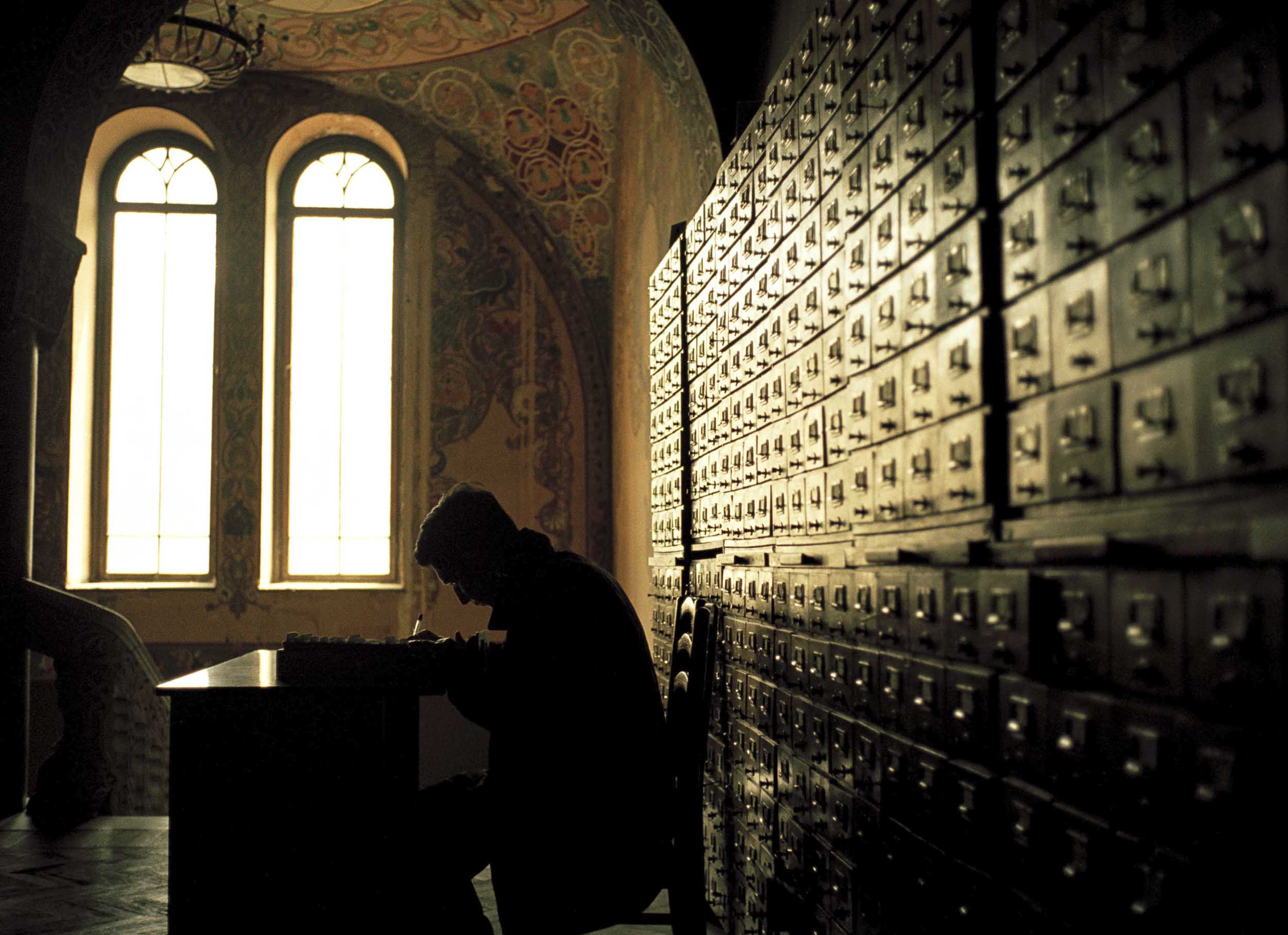 A man searches the card catalog inside the Republic of Georgia’s national library, 2005