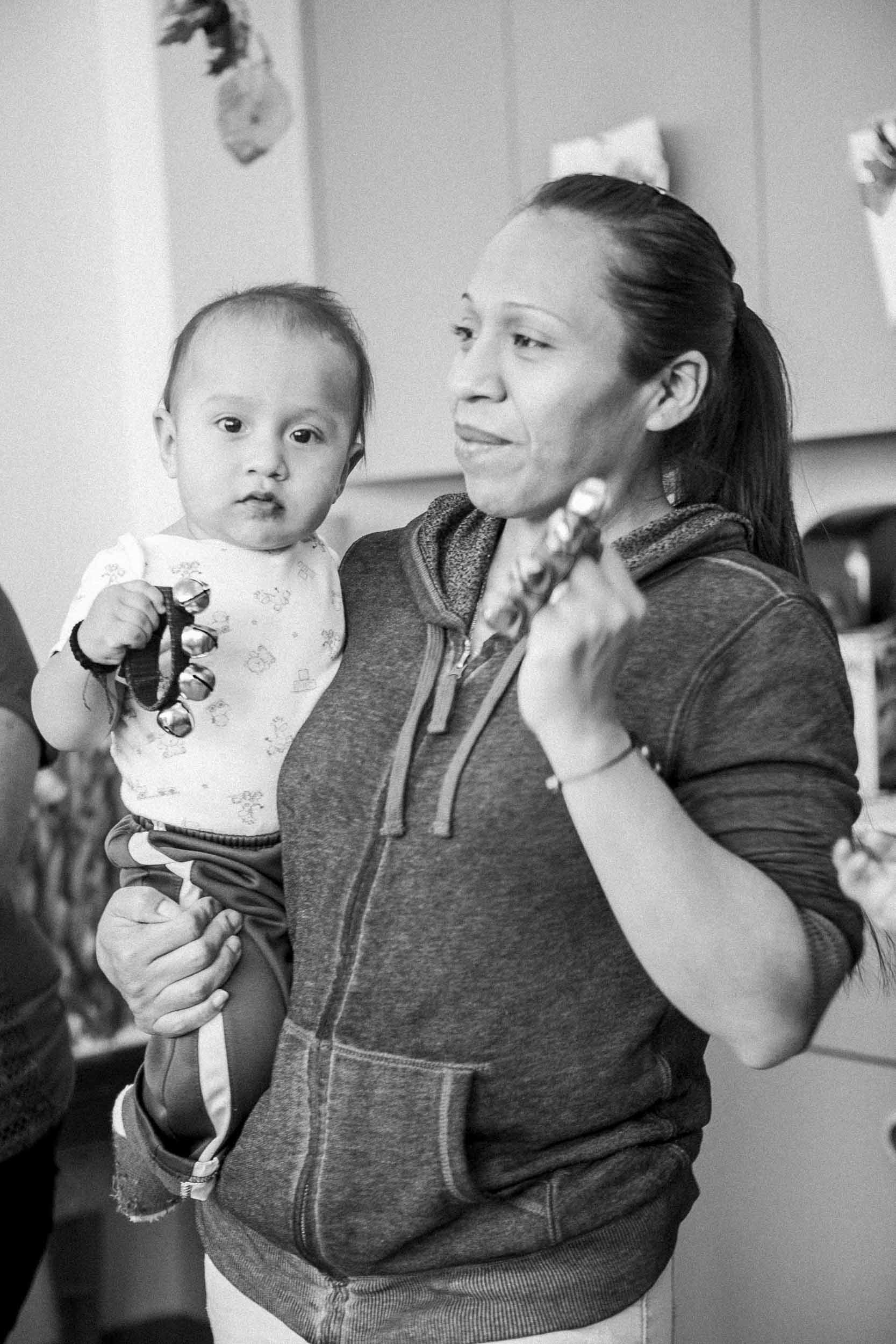 A mommy-and-me music class where children are led through song, movement and dance